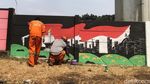 Sambut KTT ASEAN 2023, Jalan Taman Mini Dihiasi Mural
