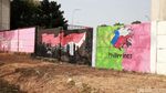 Sambut KTT ASEAN 2023, Jalan Taman Mini Dihiasi Mural