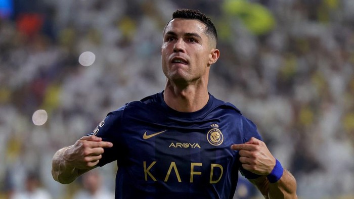 Nassrs Portuguese forward #07 Cristiano Ronaldo celebrates his second goal during the Saudi Pro League football match between Al-Nassr and Al-Shabab in Riyadhs Al-Awal Park Stadium on August 29, 2023. (Photo by Fayez Nureldine / AFP)