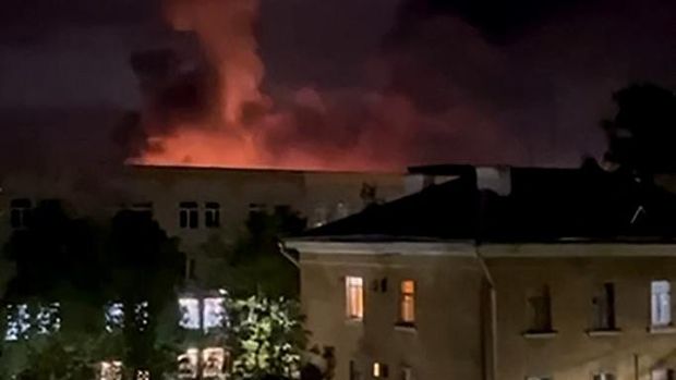 In this grab taken from a handout video posted on the Telegram account of Mikhail Vedernikov, the governor of Russia's Pskov region, on August 30, 2023, an explosion lights up the sky as the Russian military repell a drone attack on an airport in the northwestern city of Pskov. (Photo by Handout / TELEGRAM / @MV_007_PSKOV / AFP) / RESTRICTED TO EDITORIAL USE - MANDATORY CREDIT 