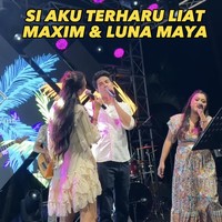 “Si aku terharu liat Maxim & Luna Maya,” begitu judul video Ayu Dewi di Instagram. Pasangan beda usia 10 tahun itu tampak tidak canggung memamerkan kemesraan mereka.  Foto: Dok. Instagram/@mrsayudewi