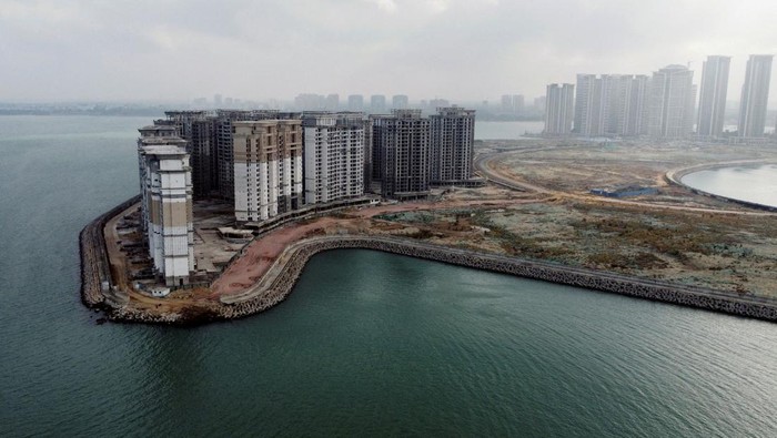 An aerial view shows the 39 buildings developed by China Evergrande Group that authorities have issued demolition order, on the man-made Ocean Flower Island in Danzhou, Hainan province, China January 7, 2022. REUTERS/Aly Song/File Photo To Match Special Report CHINA-PROPERTY/EVERGRANDE-HUI