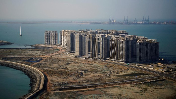 An aerial view shows the 39 buildings developed by China Evergrande Group that authorities have issued demolition order, on the man-made Ocean Flower Island in Danzhou, Hainan province, China January 7, 2022. REUTERS/Aly Song/File Photo To Match Special Report CHINA-PROPERTY/EVERGRANDE-HUI