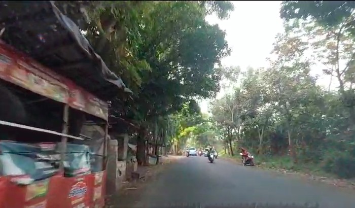 Ruas Jl Pala Raya yang semula rusak berlubang kini sudah diaspal mulus. (Dadan/Warga Pondok Cabe Udik)