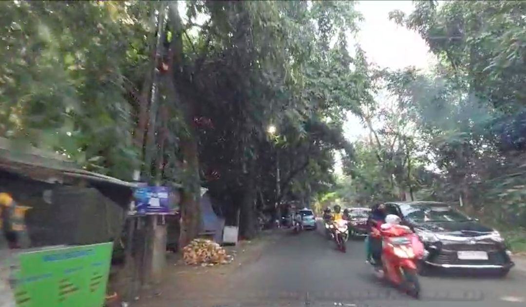 Ruas Jl Pala Raya yang semula rusak berlubang kini sudah diaspal mulus. (Dadan/Warga Pondok Cabe Udik)