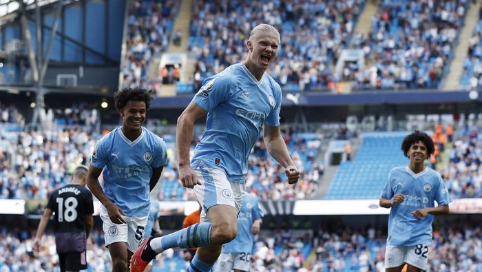 Soccer Football - Premier League - Manchester City v Fulham - Etihad Stadium, Manchester, Britain - September 2, 2023 Manchester Citys Erling Braut Haaland celebrates scoring their fifth goal and his hat-trick Action Images via Reuters/Jason Cairnduff EDITORIAL USE ONLY. No use with unauthorized audio, video, data, fixture lists, club/league logos or live services. Online in-match use limited to 75 images, no video emulation. No use in betting, games or single club /league/player publications.  Please contact your account representative for further details.