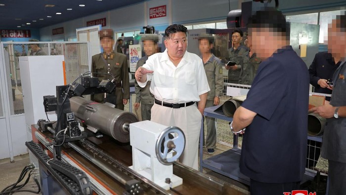 North Korean leader Kim Jong Un inspects the Pukjung Machine Complex and a major munitions factory in an undisclosed location in North Korea in this picture released by North Korea's Korean Central News Agency (KCNA) and obtained by Reuters on September 3, 2023. KCNA via REUTERS    ATTENTION EDITORS - THIS IMAGE WAS PROVIDED BY A THIRD PARTY. REUTERS IS UNABLE TO INDEPENDENTLY VERIFY THIS IMAGE. NO THIRD PARTY SALES. SOUTH KOREA OUT. NO COMMERCIAL OR EDITORIAL SALES IN SOUTH KOREA. IMAGE BLURRED AT SOURCE