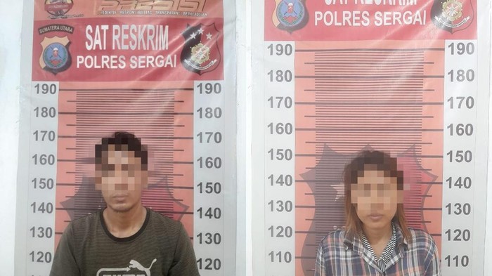 Pasutri pelaku pencurian mobil saat ditangkap. (Foto: Dok. Polres Sergai).