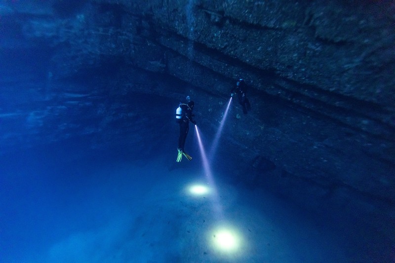 Scuba divers explore an underwater cave at the island of Brac, Croatia, September 2, 2023. REUTERS/Marko Djurica