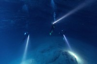 Scuba divers explore an underwater cave at the island of Brac, Croatia, September 2, 2023. REUTERS/Marko Djurica