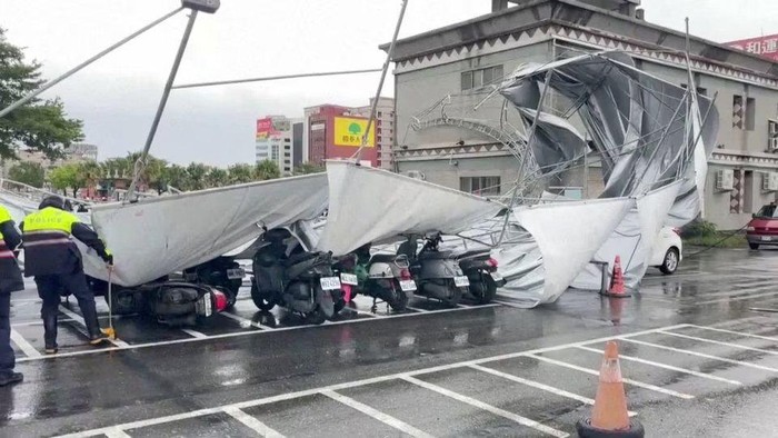 A collapsed canopy is seen at a parking lot as Typhoon Haikui approaches, in Hualien, Taiwan September 3, 2023, in this screengrab taken from a video provided by CTI. CTI via REUTERS