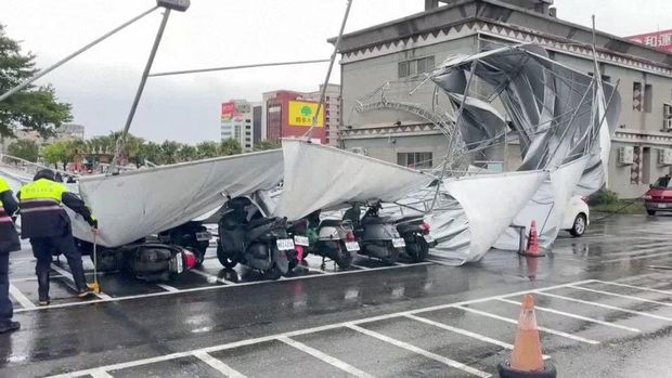 A collapsed canopy is seen at a parking lot as Typhoon Haikui approaches, in Hualien, Taiwan September 3, 2023, in this screengrab taken from a video provided by CTI. CTI via REUTERS