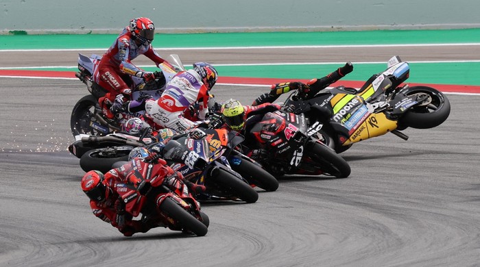 MotoGP - Catalunya Grand Prix - Circuit de Barcelona-Catalunya, Barcelona, Spain - September 3, 2023 Gresini Racing MotoGPs Alex Marquez,  Gresini Racing MotoGPs Fabio Di Giannantonio, Pramac Racings Johann Zarco  and Mooney VR46 Racing Teams Marco Bezzecchi crash at the start of  the MotoGP race REUTERS/Nacho Doce     TPX IMAGES OF THE DAY