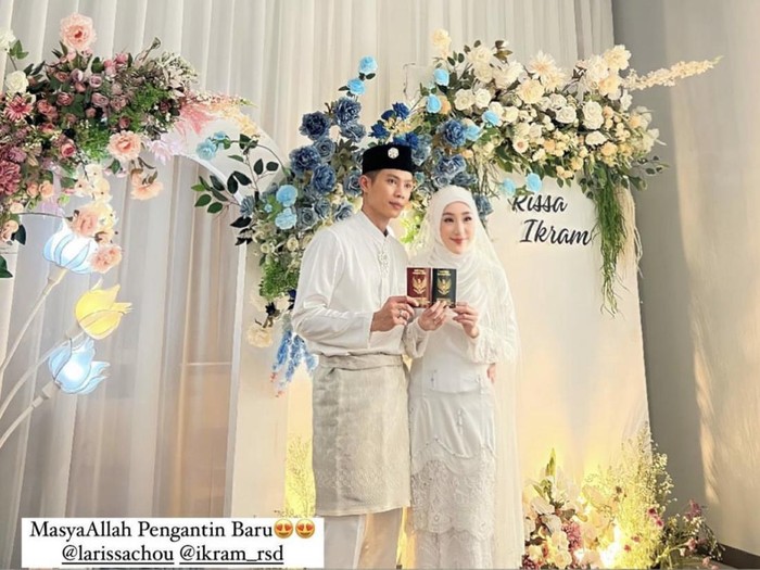 Gaya Larissa Chou menggunakan model hijab dan gaun ala pengantin Melayu.