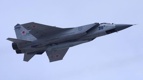 A Russian MiG-31 fighter jet equipped with a Kinzhal hypersonic missile flies over Red Square during a rehearsal for a flypast, part of a military parade marking the anniversary of the victory over Nazi Germany in World War Two, in central Moscow, Russia May 7, 2022. REUTERS/Maxim Shemetov/File Photo Acquire Licensing Rights