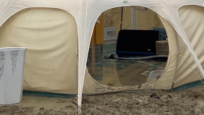 A general view shows inundated tents and mud during the Burning Man event, at the temporary desert settlement of Black Rock City, Nevada, U.S., September 3, 2023 in this screen grab taken from a social media video. Evi Airy/via REUTERS  THIS IMAGE HAS BEEN SUPPLIED BY A THIRD PARTY. MANDATORY CREDIT.