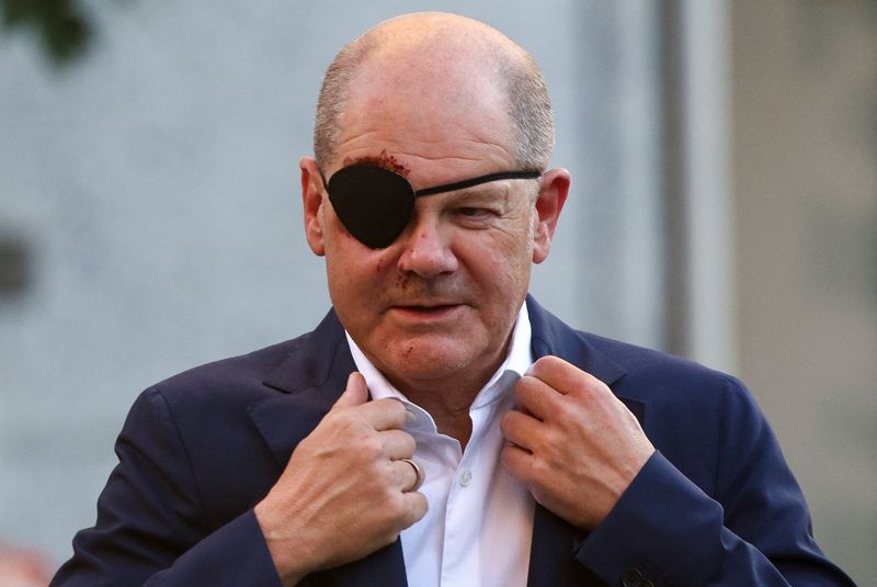 German Chancellor Olaf Scholz wears an eye patch during his first official appearance following his jogging injury in Berlin, Germany, September 4, 2023. REUTERS/Lisi Niesner