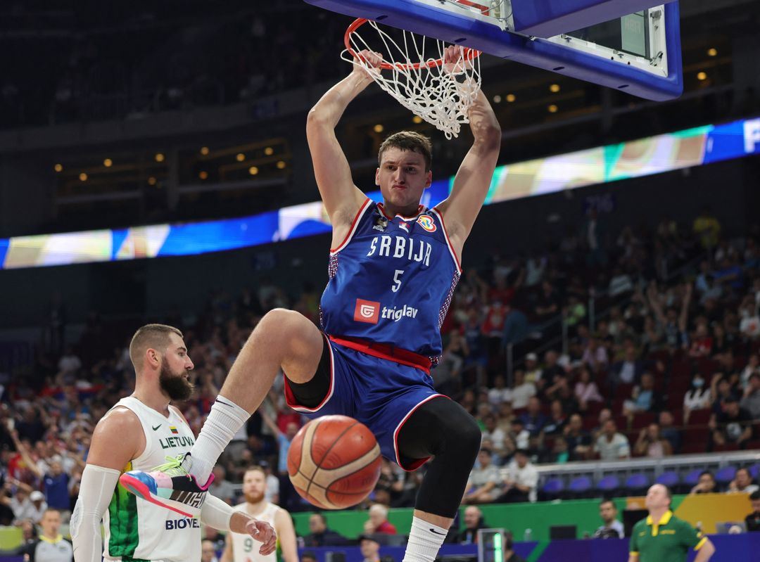 Basketball - FIBA World Cup 2023 - Quarter-Final - Lithuania v Serbia - Mall of Asia Arena, Manila, Philippines - September 5, 2023 Serbia's Nikola Jovic scores a basket REUTERS/Eloisa Lopez