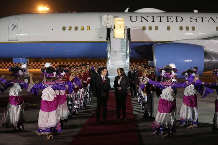 U.S. Vice President Kamala Harris, right, talks with Indonesian Health Minister Budi Gunadi Sadikin as traditional dancers perform, upon arrival to attend the Association of the Southeast Asian Nations (ASEAN) Summit at Soekarno-Hatta International Airport in Tangerang on the outskirts of Jakarta, Indonesia,Tuesday, Sept. 5, 2023. (AP Photo/Achmad Ibrahim, Pool)
