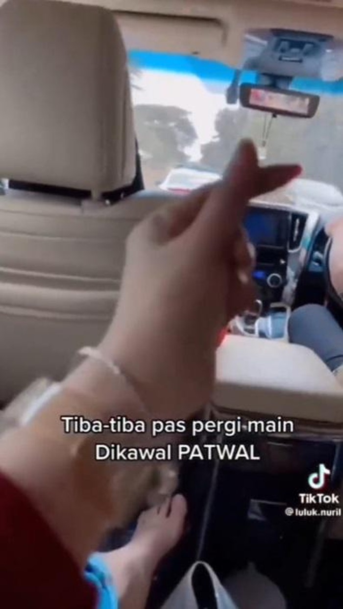 Video TikTok @luluk.nuril pamer liburan dikawal Patwal.