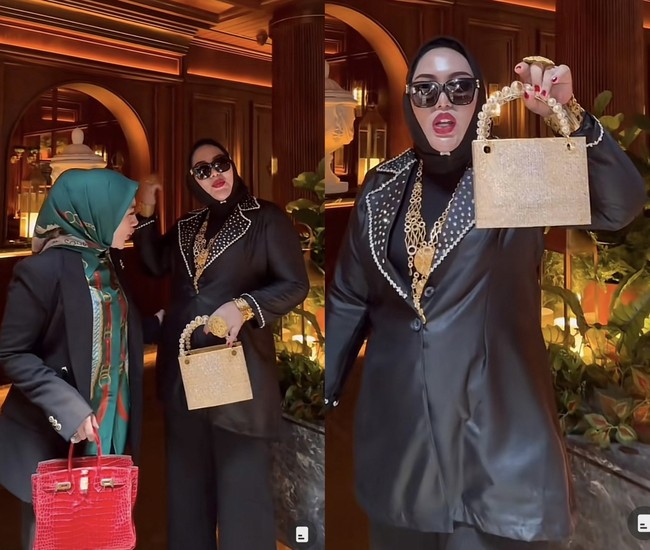 Shella Saukia selanjutnya menghampiri Mira Hayati yang sempat viral karena membeli tas dari emas. Mira menyebutkan tas emas yang dibawanya beratnya 1,5 kg dengan harga sekitar Rp 1 Miliar. Gelang yang Mira pakai totalnya Rp 200 juta. Total keseluruhan outfit dari pemilik kosmetik, MH Miracle Whitening Skin itu sekitar Rp 2 Miliar. Foto: Dok. TikTok @shellasaukia.
