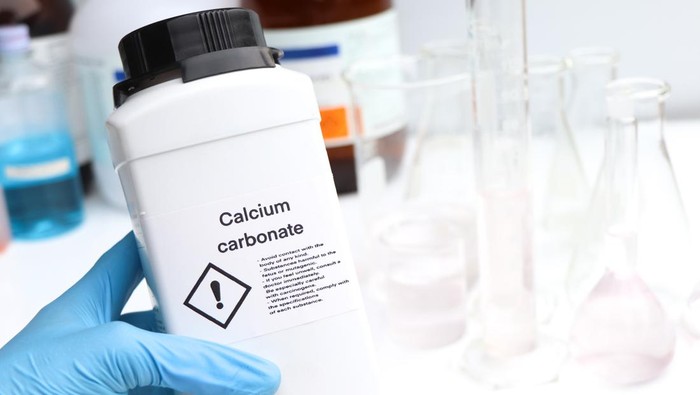 Calcium carbonate in bottle, chemical in the laboratory and industry, Chemicals used in the analysis