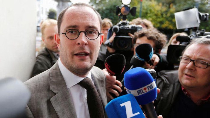 Vincent Van Quickenborne talks to the media as he arrives at a budgetary control meeting in Brussels October 17, 2012. REUTERS/Francois Lenoir/File Photo Acquire Licensing Rights