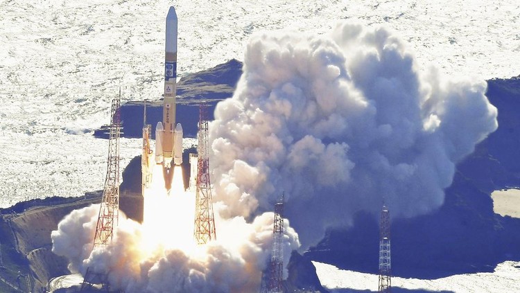 An HII-A rocket is launched from the launch pad at Tanegashima Space Center in Kagoshima, southern Japan Thursday, Sept. 7, 2023.  Japan launched a rocket Thursday carrying an X-ray telescope that will explore the origins of the universe as well as a small lunar lander.  (Kyodo News via AP)
