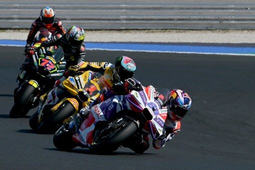 Prima Pramac Racing's Spanish rider Jorge Martin leads Ducati Lenovo Team's Italian rider Francesco Bagnaia and Mooney VR46 Racing Team's Italian rider Marco Bezzecchi as they compete during the San Marino MotoGP Grand Prix at the Misano World Circuit Marco-Simoncelli in Misano Adriatico on September 10, 2023. (Photo by Filippo MONTEFORTE / AFP)