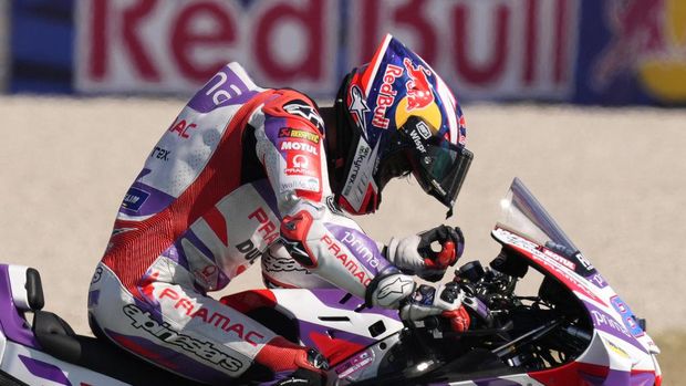 Spain's Jorge Martin on his Ducati celebrates after winning the MotoGP race of the San Marino and Riviera di Rimini Motorcycle Grand Prix at the Misano circuit in Misano Adriatico, Italy, Sunday, Sept. 10, 2023. (AP Photo/Antonio Calanni)