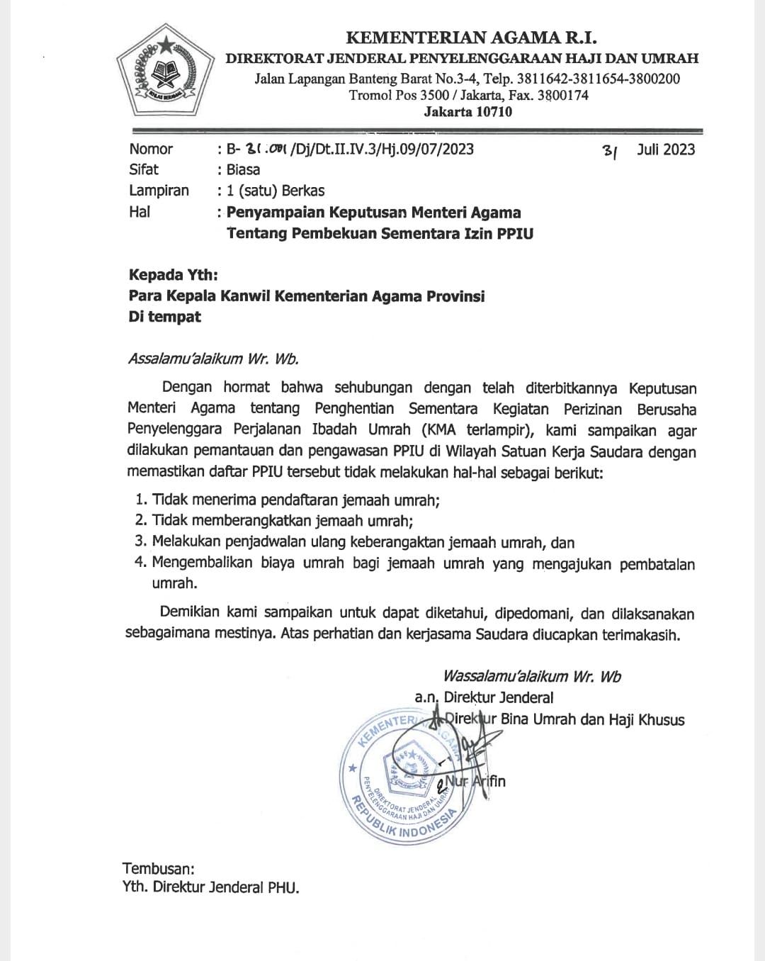 Keputusan Menteri Agama terkait pembekuan izin biro umrah.