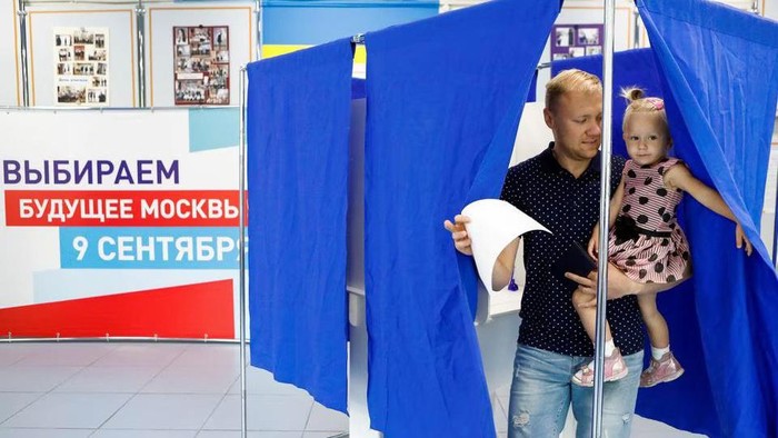 A man leaves a voting booth during mayoral election at a polling station in Moscow, Russia September 9, 2018. REUTERS/Sergei Karpukhin/File Photo Acquire Licensing Rights