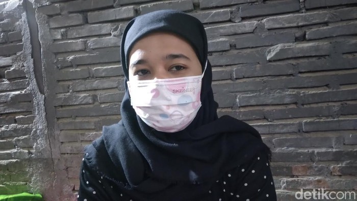 anak kandung MH, Rila Hasan.
