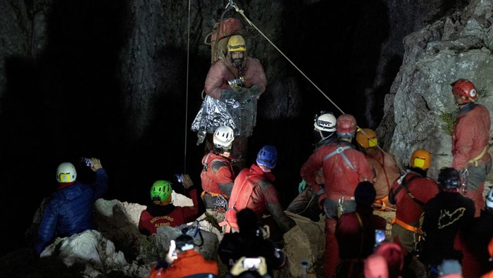 U.S. caver Mark Dickey, on a stretcher, is carried out of the Morca cave as his rescue operation comes to a successful end near Anamur in Mersin province, southern Turkey September 12, 2023. REUTERS/Umit Bektas