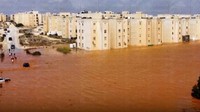 Jalan-jalan terendam banjir setelah badai Daniel di Marj, Libya, Senin, Senin (11/9/2023). Kepala salah satu pemerintahan saingan Libya mengatakan bahwa 2.000 orang dikhawatirkan tewas dalam banjir yang melanda bagian timur negara Afrika utara itu. Libya Almasar TV via AP  