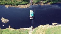 Foto udara Sungai Cileungsi yang airnya hitam tercemar limbah di kawasan Ciangsana, Gunung Putri, Kabupaten Bogor, Jawa Barat, Selasa (12/9/2023). 