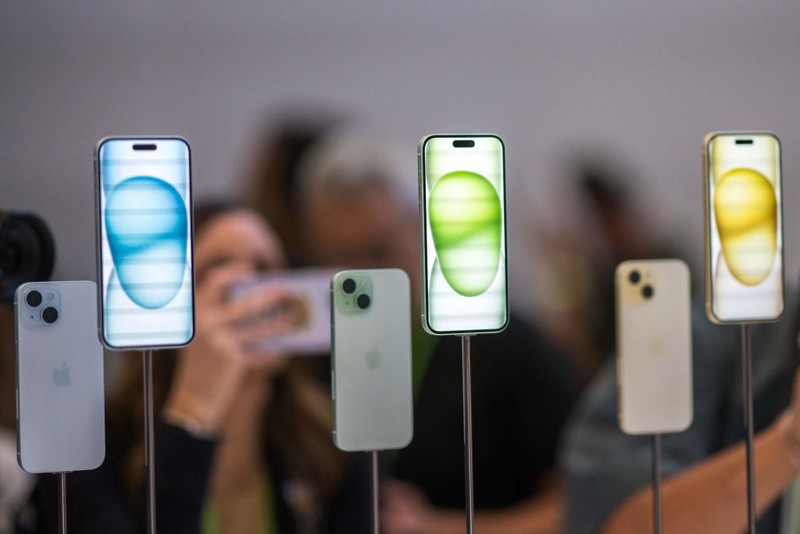 The new Apple iPhone 15 Pro models, with EU ordered USB-C charger, is displayed amongst other new products during a launch event at Apple Park in Cupertino, California, on September 12, 2023. (Photo by Nic Coury / AFP) (Photo by NIC COURY/AFP via Getty Images)