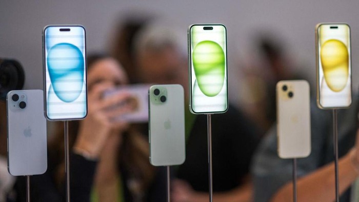 The new Apple iPhone 15 Pro models, with EU ordered USB-C charger, is displayed amongst other new products during a launch event at Apple Park in Cupertino, California, on September 12, 2023. (Photo by Nic Coury / AFP) (Photo by NIC COURY/AFP via Getty Images)