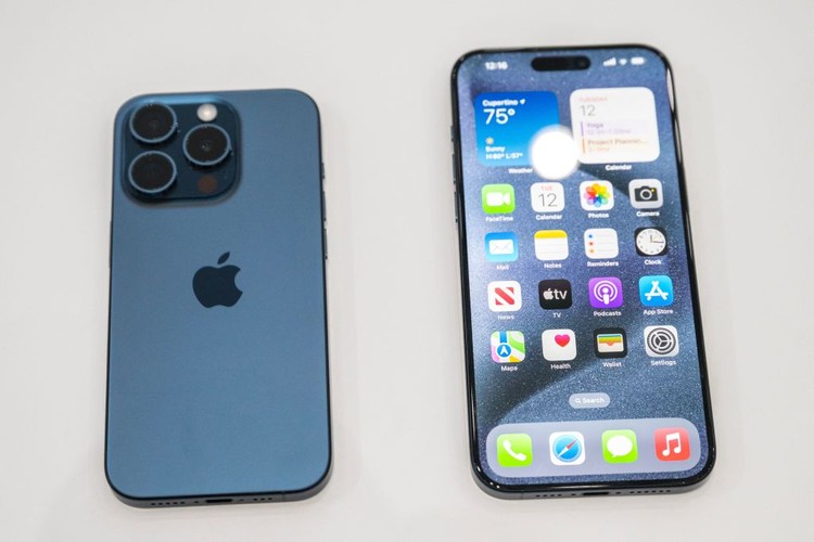 The new Apple iPhone 15 Pro models, with EU ordered USB-C charger, is displayed amongst other new products during a launch event at Apple Park in Cupertino, California, on September 12, 2023. (Photo by Nic Coury / AFP) (Photo by NIC COURY/AFP via Getty Images)