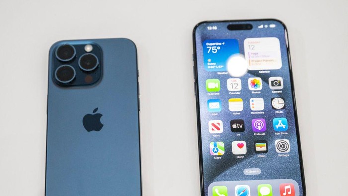 The new Apple iPhone 15 Pro models, with EU ordered USB-C charger, is displayed amongst other new products during a launch event at Apple Park in Cupertino, California, on September 12, 2023. (Photo by Nic Coury / AFP) (Photo by NIC COURY/AFP via Getty Images)