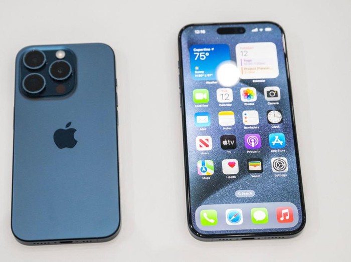 The new Apple iPhone 15 Pro models, with EU ordered USB-C charger, is displayed amongst other new products during a launch event at Apple Park in Cupertino, California, on September 12, 2023. (Photo by Nic Coury / AFP) (Photo by NIC COURY/AFP via Getty Images)