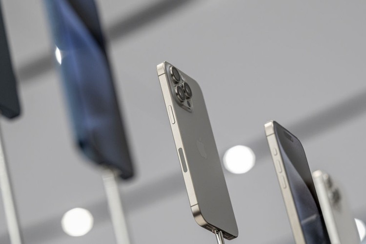 iPhone 15 The Apple iPhone 15 Pro Max during an event at Apple Park campus in Cupertino, California, US, on Tuesday, Sept. 12, 2023. Apple Inc. introduced its latest iPhones at an event Tuesday, banking on new materials, camera upgrades and improved performance to coax back consumers in a sluggish smartphone market. Photographer: David Paul Morris/Bloomberg via Getty Images