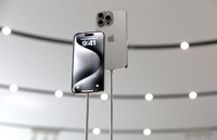 CUPERTINO, CALIFORNIA - SEPTEMBER 12: The new iPhone 15 Pro is displayed during an Apple event at the Steve Jobs Theater at Apple Park on September 12, 2023 in Cupertino, California. Apple revealed its lineup of the latest iPhone 15 versions as well as other product upgrades during the event. (Photo by Justin Sullivan/Getty Images)