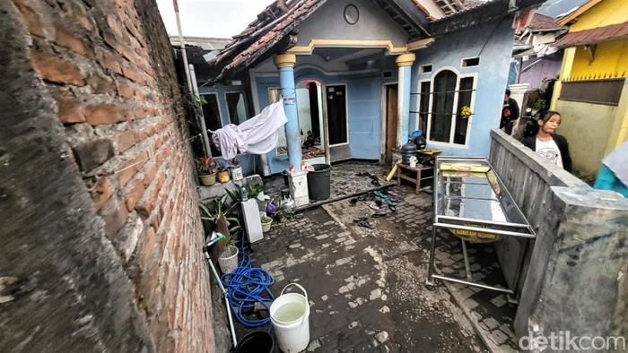 Lokasi rumah korban, di halaman rumah ini korban ditemukan tergeletak bersimbah darah