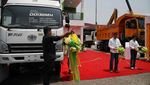 Melihat Deretan Truk yang Tampil di Pameran Alat Pertambangan