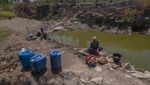 Warga Juwangi Manfaatkan Sisa Air Sungai yang Keruh untuk Cuci-Mandi