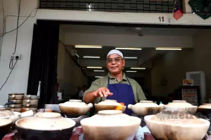 Penjual nasi ayam yang diduga pakai arak beras bersumpah hanya menggunakan minyak wijen.