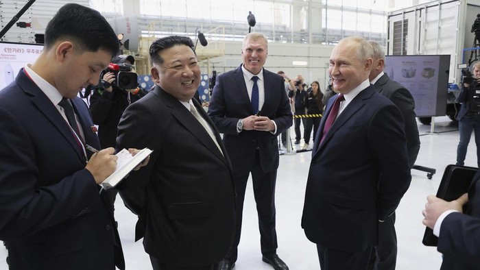 In this photo provided by the North Korean government, Russian President Vladimir Putin, right, and North Korean leader Kim Jong Un visit the Vostochny cosmodrome outside the city of Tsiolkovsky, about 200 kilometers (125 miles) from the city of Blagoveshchensk in the far eastern Amur region, Russia, Wednesday, Sept. 13, 2023. Independent journalists were not given access to cover the event depicted in this image distributed by the North Korean government. The content of this image is as provided and cannot be independently verified. Korean language watermark on image as provided by source reads: 