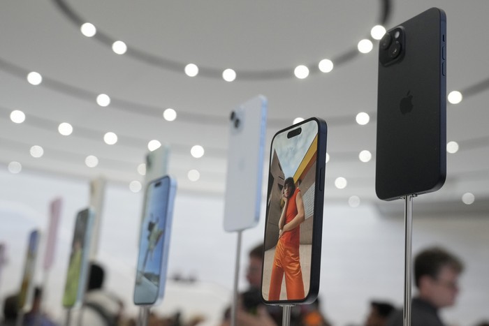 The iPhone 15 phones are shown during an announcement of new products on the Apple campus in Cupertino, Calif., Tuesday, Sept. 12, 2023. (AP Photo/Jeff Chiu)