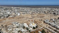 Banjir yang digambarkan seperti tsunami itu mengakibatkan kerusakan di berbagai wilayah. AP Photo/Muhammad J Elalwany.